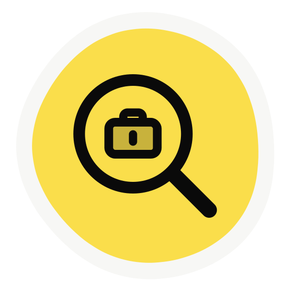 Employment assistance icon: magnifying glass over a briefcase